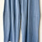 up close of model wearing cornflower cotton wide leg pants with side inlets