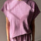 model wearing dusty lilac cotton tee with slight cap sleeves and matching shorts