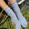 model wearing light blue ribbed scalloped socks