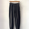 charcoal pointelle jogger pants hanging on a wall