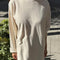 model wearing naturel long sleeve tee with deep side vents