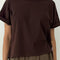 model wearing dark brown relaxed fit tee
