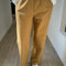 model wearing dijon yellow cotton straight leg work pants