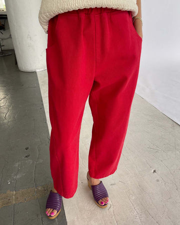model wearing crayon red cotton pants with pockets