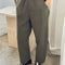 model wearing olive relaxed fit pants
