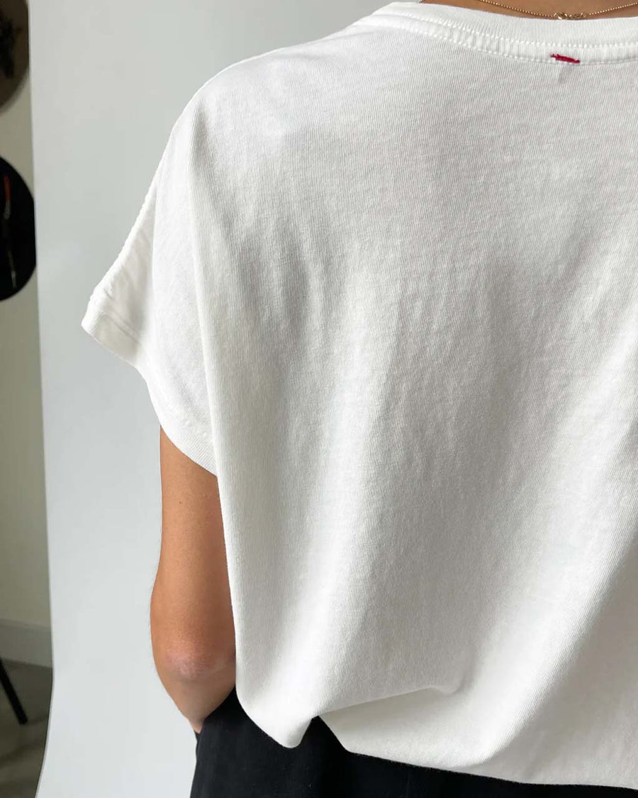 back view of model wearing vintage white relaxed vintage tee