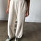 model wearing light cream french terry balloon pants