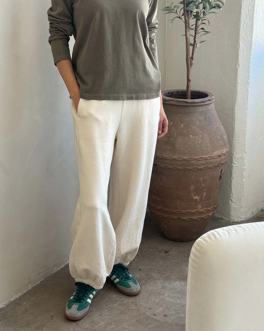 model wearing light cream french terry balloon pants