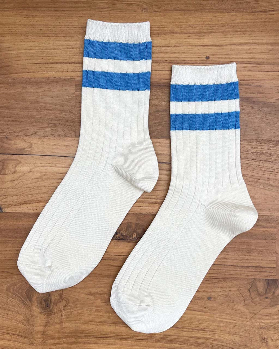 cream high crew socks with double blue stripes at the top