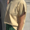 side view of model wearing butter yellow relaxed fit cotton tee