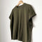 olive green muscle tee on a hanger