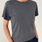 model wearing charcoal relaxed fit tee with a slight crop