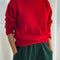 model wearing red mohair pull over sweater