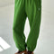 model wearing avocado french terry balloon pants with side pockets and side panels