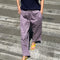 model wearing dried lavender carpenter cotton pants