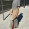 side view of model wearing heather grey relaxed fit t-shirt maxi dress