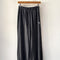 charcoal pointelle cotton balloon pants on a hanger