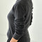 back view of model wearing charcoal pointelle long sleeve tee