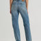 backview of model wearing classic straight leg jeans with medium gritty wash with distressing on the knees