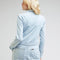 backview of model wearing light denim unionall with back pockets