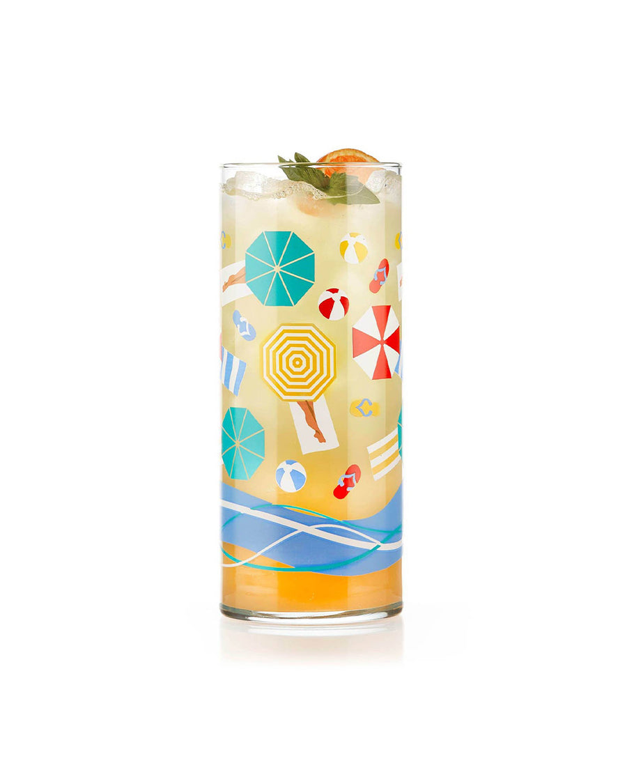 vintage beach scene glass with liquid inside