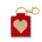 completed red needlepoint keychain kit with baby blue trim, tan heart and gold hardware