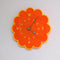 orange retro floral clock with yellow trim