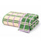 folded cream towel with kelly green and lilac stripes (and the reversible side is green with cream and lilac stripes)