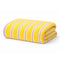 folded yellow towel with lavender stripes