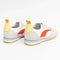 back view of white sneakers with orange, yellow and blue retro accents