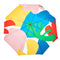 top view of white compact umbrella with wooden duck head handle and colorful abstract shape print