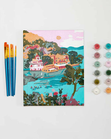 painted mini paint by numbers kit with colorful portofino scene with brushes and pots of acrylic paint