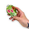 model holding green, red and cream ornament shaped hair claw