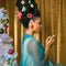 red and pink ornament shaped hair claw in models hair