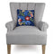 navy blues square pillow with colorful flowers bouquet print on a chair