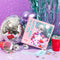 colorful 'first dance' 1000 piece puzzle surrounded by streamed, balloons and disco ball