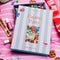 boxed 1000 piece puzzle with fun sleepover inspired graphic with a bowl of popcorn, magic 8-ball, snacks, games and phone