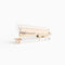 side view of gold acrylic stapler