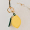 lemon zipped bag charm with clip on bag