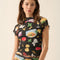 model wearing black fitted mesh top with ruffle sleeves and all over pasta and veggie print