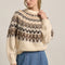model wearing cream soft sweater with brown and tan nordic print