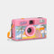 side view of pink 35mm camera with retro malibu barbie print