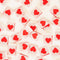 scattered set of 8 cream sewing labels with a red heart in the center