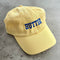 pastel yellow dad hat with blue 'BUTTER' across the front