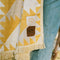 yellow and white geometric driftweave beach blanket