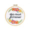completed 'this took forever' cross stitch kit with floral border