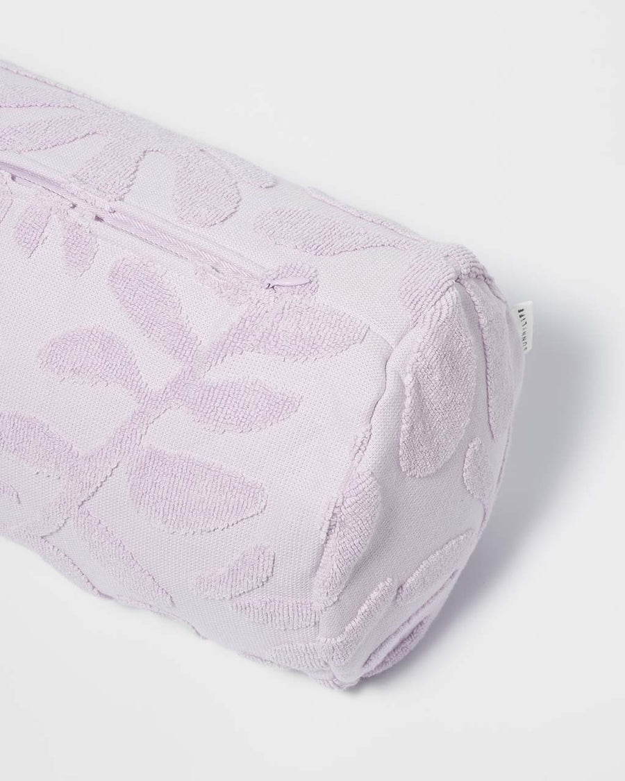 up close of lavender textured floral inflatable beach pillow