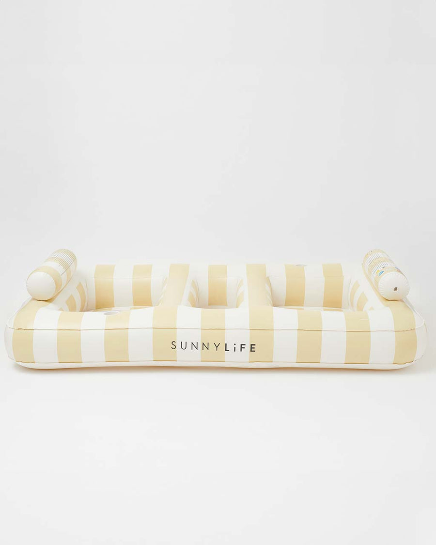 side view of oversized pastel yellow and white stripe float for two people