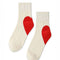 side view of white socks with red hearts on the heels
