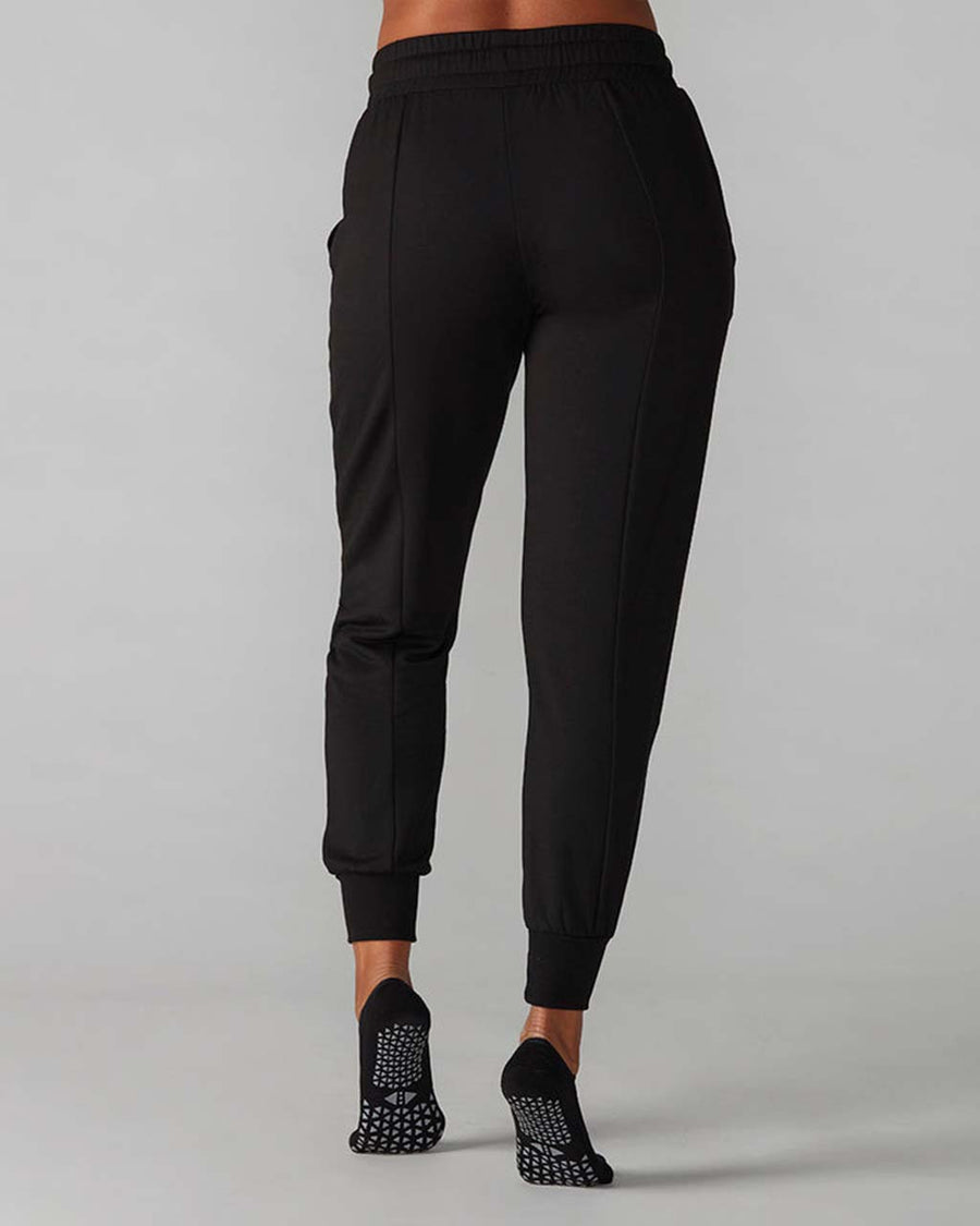 back view of model wearing black jogger pants